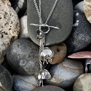 The Sterling silver Double Peony Flower Necklace is on a long 34 inch chain, with a T-bar at the front. it can be worn as a long necklace or doubled around to be worn as a stylish shorter necklace. 