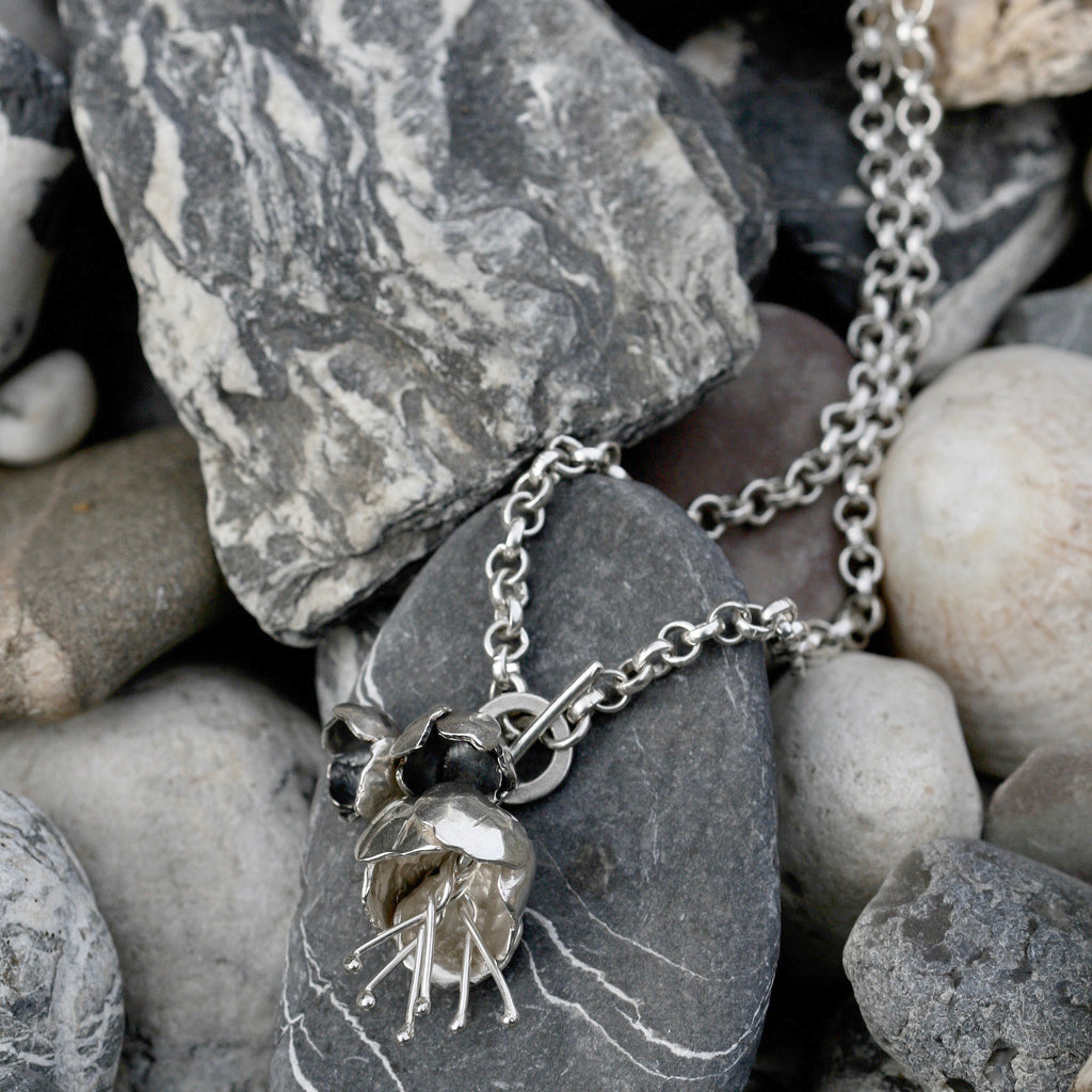 Floral Sterling silver hallmarked statement necklace. This is a lovely necklace 17 inch long which will sit at the nape of the neck, with a T bar catch at the front. A Peony and 2 buttercups nestled next to each other. The chain is a classic round link heavy belcher style.